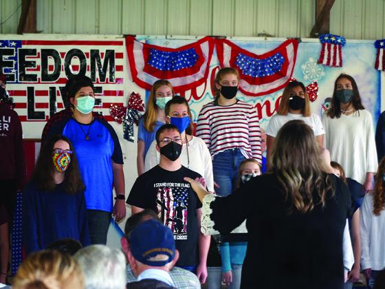 The Gilmer High School Chorus sings “America The Beautiful” under the direction of Hannah Carter.