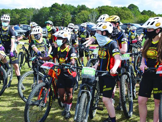 Team Cartecay riders prepare for their warmup ahead of the Georgia Interscholastic Cycling League’s Peach State Championships Nov. 9.
