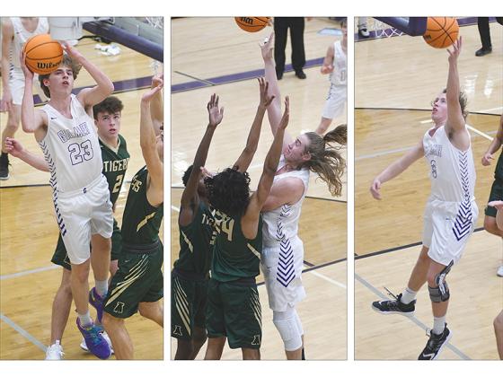 From left, are Gilmer High varsity Bobcats Ethan Banks, Cade Carter and Carson Pierce scoring points prior to program’s two-week layoff because of COVID-19.