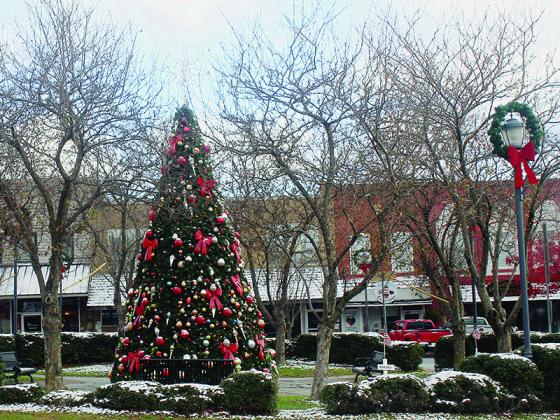 An early dusting of snow lent a Christmas card feel to the decorated downtown Ellijay square Tuesday morning.