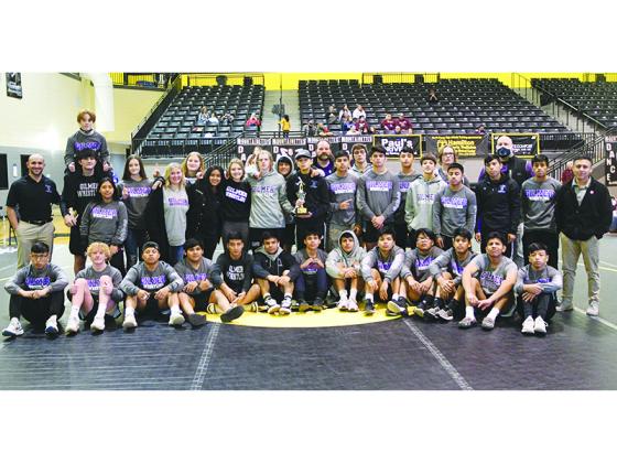 Above are Gilmer High wrestlers, coaches and managers following the Bobcats’ area duals championship last Friday at North Murray High School.