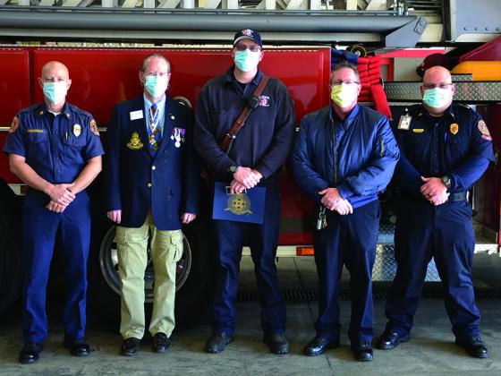 Sid Turner, vice president of the Blue Ridge Mountains chapter of the Sons of the American Revolution, joins representatives from Gilmer County Public Safety to present the SAR chapter’s awards for Firefighter and EMS Employee of the Year to Michael Dockery and Les Eisenhart. Pictured, from left: Fire Chief Daniel Kauffman, Turner, Dockery, EMS Chief Russell Brown and Deputy Fire Chief Mark Chastain.