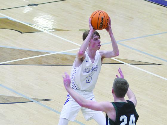 Gilmer’s Brady Sanford (5) searches for an open teammate and scored 21 points versus Dawson County last week.