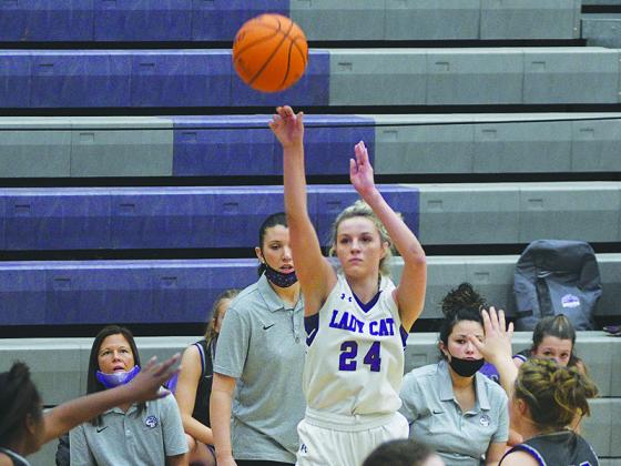 Emma Callihan shoots a three pointer and scored 31 points versus Cherokee Bluff last Thursday before tallying 24 more against White County two days later.