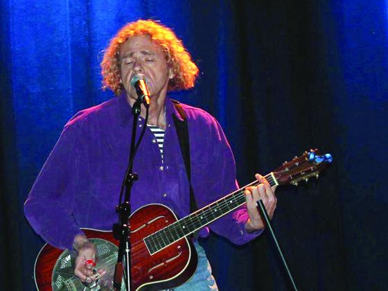 Bean performs solo at an Acoustic Blends showcase presented by Gilmer Arts.