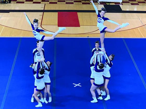 Gilmer High cheerleaders perform at last week’s region competition where they placed second to advance to next Tuesday’s state finals.