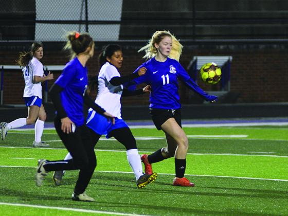 Gilmer Lady Cat Anna Byrd (11) gets in position to gain possession and has been a versatile player for GHS this season playing multiple positions on the field.