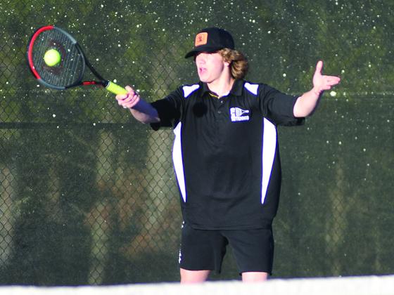 Pictured are Gilmer High doubles Law Lykins (above) and Hannah Walker (below).