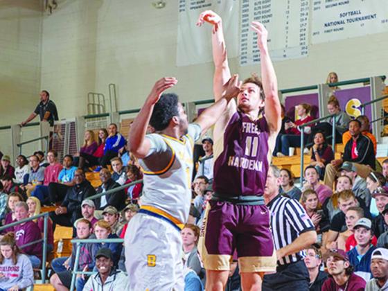John Musselwhite shoots a jump shot for Freed-Hardeman University and earned an all Mid-South honorable mention at the conclusion of the basketball season.