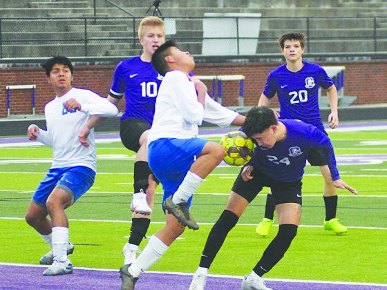 Gilmer’s Gabi Sanchez (24) gets his head on the ball after a corner kick, which was quickly met by a knee last Tuesday versus Trion. He later scored Gilmer’s first goal and netted two more against Lumpkin Friday.