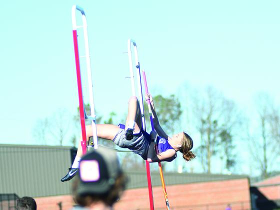 Gilmer High Lady Cats Emily Hancock (above) and Taylor McCormick (below) finished second in the pole vault and high jump, respectively, at last Saturday’s Southeast High School Invitational.