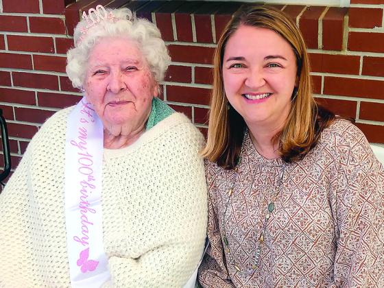 Marie Holt, left, is pictured at her 100th birthday party with granddaughter, Amanda Payne. 