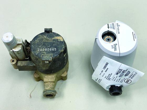 The Ellijay-Gilmer County Water and Sewerage Authority wants to begin replacing manually-read Elster water meters, at left, with automated Sensus iPerl meters, at right, sometime in 2022.