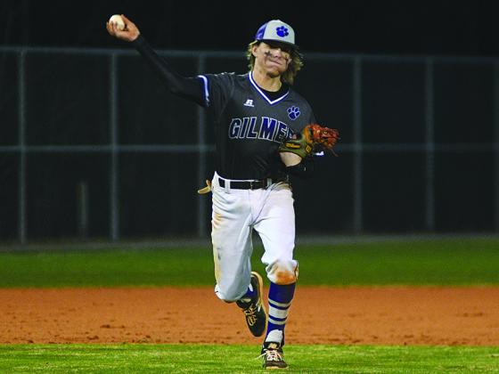 Bobcat third baseman Spencer Merritt makes a throw to first and will be one of Gilmer’s seniors next season.
