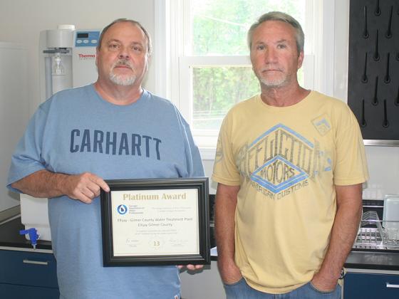 Cartecay Water Treatment Plant Superintendent Gary Nix, left, and assistant superintendent Dale Stanley with the Platinum Award the Ellijay-Gilmer plant recently received from the Georgia Association of Water Professionals.