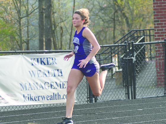 Naomi Coombs set five cross-country and track records at Gilmer High School and will continue her athletic and academic endeavors at Kennesaw State University.