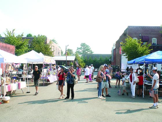 Vendors in the River Street parking area