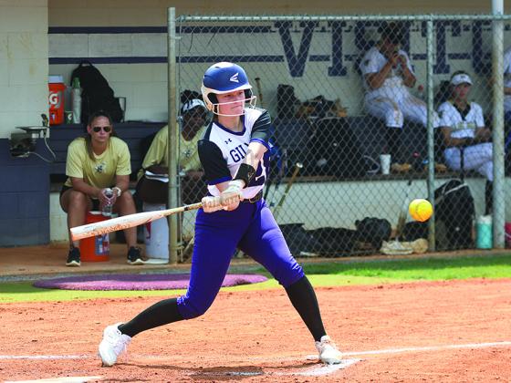 Gilmer’s Jacie Bennett keeps her eye on the ball in the Lady Cats’ season opener versus Sprayberry last Saturday.