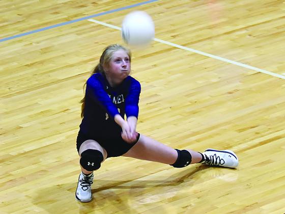 Libby Pike digs a ball during the Mountain Madness Opener. (Contributed photos by Greg Withrow)