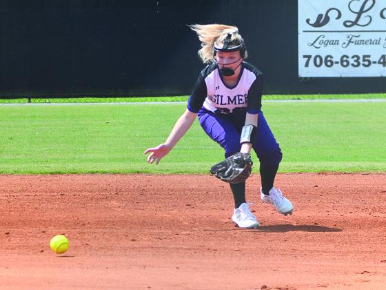 Gilmer High School freshman shortstop Sierra Williams fields a ground ball for the Lady Cats.