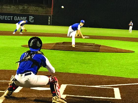 Pitcher Austin Zabala hurls the ball to his brother, catcher Blake Zabala during a travel game. The home-schooled duo will take the field for Gilmer High next season.