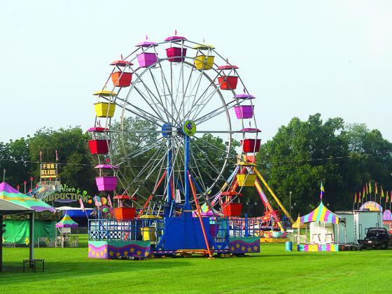 The midway of the Gilmer County Fair is shown being set up Tuesday morning. The fair was scheduled to kick off Tuesday, Aug. 10, and run until Sunday, Aug. 15, as the event returns to the Ellijay Lions Club Fairgrounds after being canceled last year. Event times are 5-10 p.m. on Tuesday, Wednesday and Thursday; 5-11 p.m. on Friday and Saturday, and 4-10 p.m. on Sunday. 