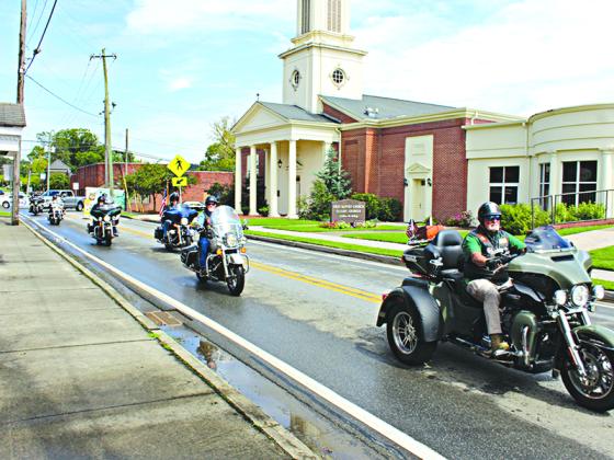Following his memorial service at Ellijay First Baptist Church, Ron Gravett is escorted by members of the Special Operations Association Riders to Georgia National Cemetery in Canton on his final ride. 