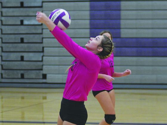 Gilmer’s Anneliese Vaughn keeps a rally alive as she passes to a teammate last Thursday versus Fannin County.
