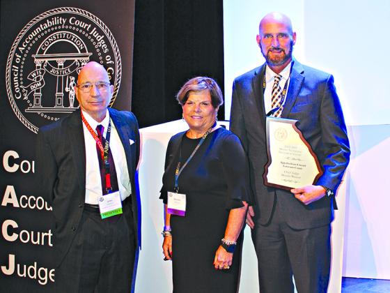 The Veterans Court of the Appalachian Judicial Circuit (Gilmer, Fannin and Pickens counties) recently received “Model Court” status from the Council of Accountability Court Judges in Georgia. The award conveys the program as a flagship Veterans Court for other judicial circuits around the state desiring to implement one. From left are Veterans Court case manager John Di Renzo, Senior Judge Brenda Weaver and coordinator Chris Holt.