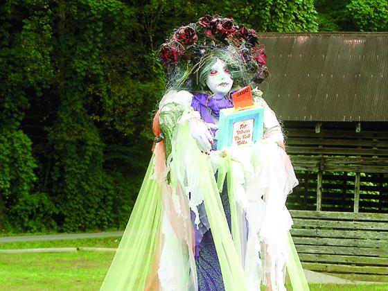 The Ghost of Overdue Books, made by Friends of the Gilmer County Library, is among the many scarecrows that can be seen by those trick-or-treating at Harrison Park.
