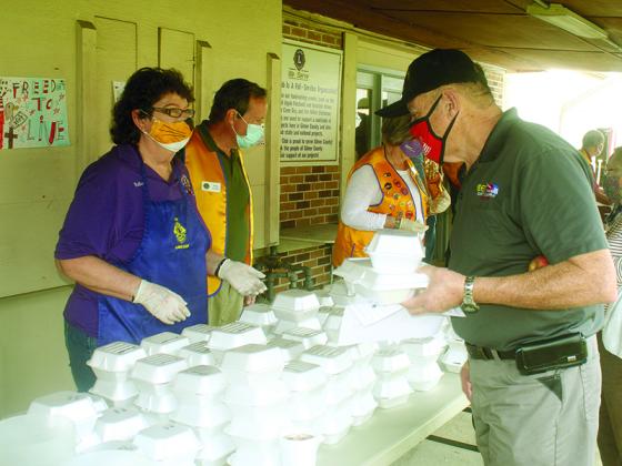 Ellijay Lions Club members will serve boxed barbecue lunches to veterans and their families during a complimentary Veterans Day program at the fairgrounds Thursday, Nov. 11. 