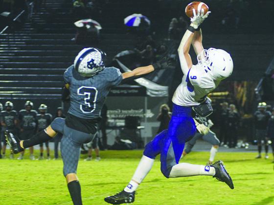 Gilmer High senior Dominic Tarantino intercepts a White County pass in the second quarter of last Friday’s game.