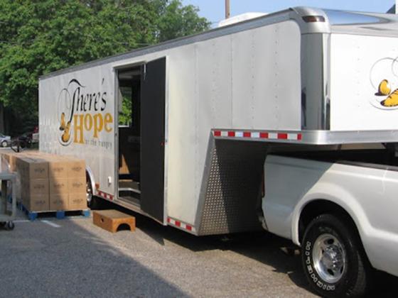 There’s Hope For the Hungry, a nonprofit food ministry based in Forsyth County, brings food boxes by truck to Cartecay Baptist Church the fourth Tuesday of each month. 