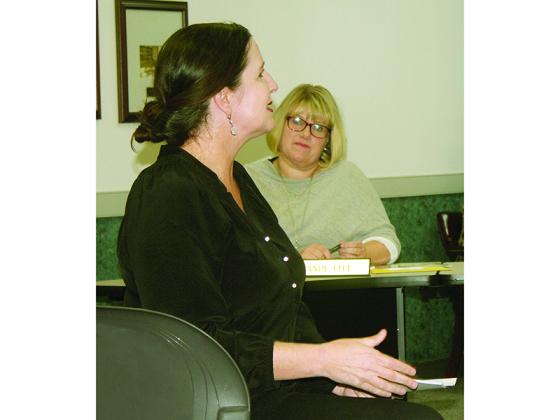 Gilmer Chamber President and CEO Jennifer Grimmer, front, talks to the Ellijay City Council about different levels of hotel-motel tax that can be implemented by Georgia cities and counties. Also pictured, in back, is councilwoman Sandy Ott. 