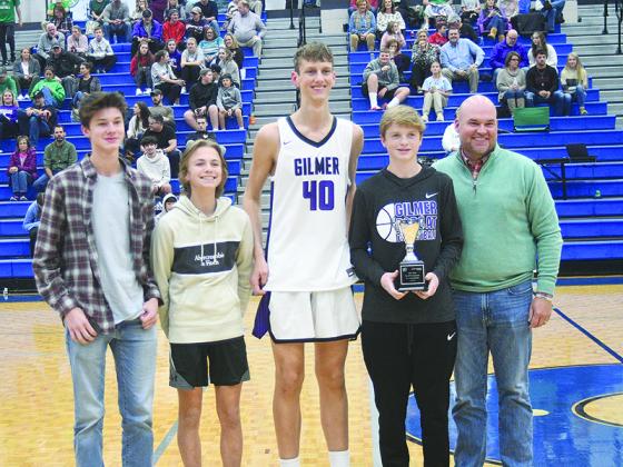 Along with ETC’s Jason Smith are JV Bobcats Mack Kiser, Cooper Farmer, Jackson McVey and J.D. Taylor with their championship trophy.