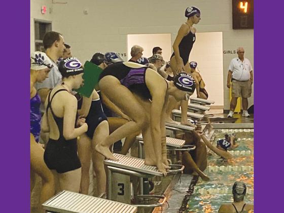 Gilmer’s Lillie Martin is ready to enter the pool at last Saturday’s Tiger Plunge in Adairsville.