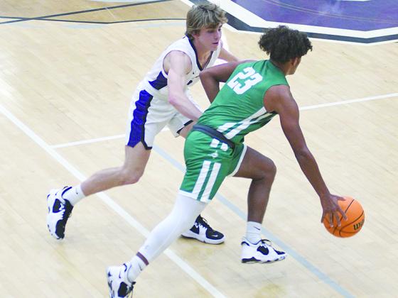 Gilmer’s Christian Sumner defends in the press and hit five three pointers in the Bobcats’ win over Lumpkin County last Tuesday.