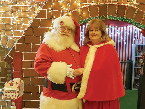 Santa Von Redman and his Mrs. Claus, wife, Sheryl.