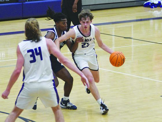 Gilmer senior Ethan Banks (23) led the Bobcats with 14 points versus Lassiter and Pickens in last week’s Christmas tournament.