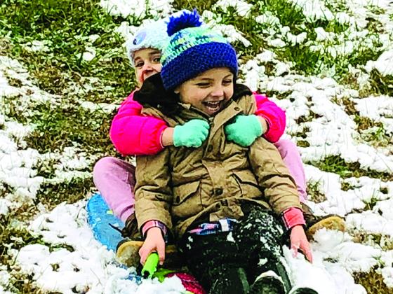 Best friends Kolby Richard and Mila Gusic had fun sledding at the River Park on Monday, Jan. 17.