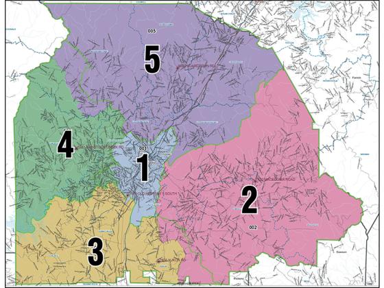 The colored portions of the above map represent Gilmer’s board of education districts that were adopted last month. The green line represents districts of the previous map that was drafted and used from 2012 through 2021.