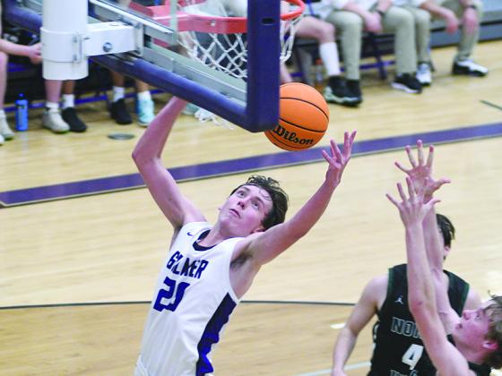Gilmer senior Lewis Mulkey grabs one of nine rebounds versus North Hall last Tuesday. He also led the Bobcats with 20 points in Gilmer’s final home game of the regular season.