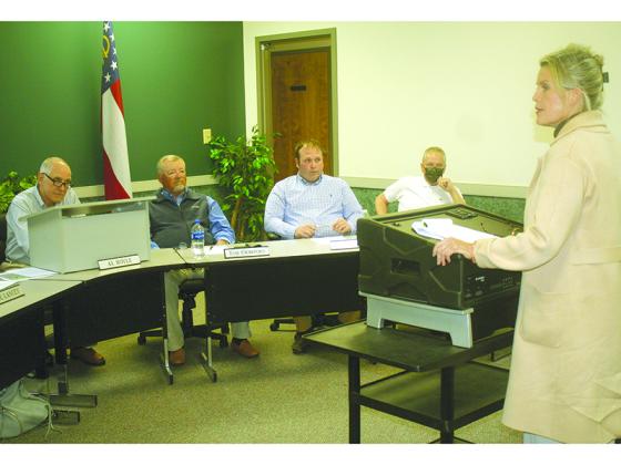 During Monday’s Ellijay City Council meeting, Pam O’Dell, executive director of the Short-Term Rental Owners Association of Georgia, right, speaks to Mayor Al Hoyle and councilmembers about the city’s short-term rental ordinance.