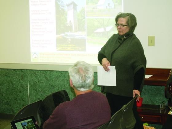 Architect Barbara Black, right, is joined by Mike Lancaster, of Friends of Harrison Park, left, during a presentation to the Ellijay City Council about plans to restore the park’s almost 100-year-old barn, below.