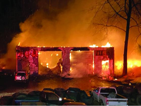 Flames engulfed Wholesale Tires, on Old Highway 5 North, early last Wednesday morning. (Photo by Gilmer Fire & Rescue)
