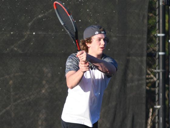 ilmer High singles tennis player Bobcat Law Lykins during a recent home match.