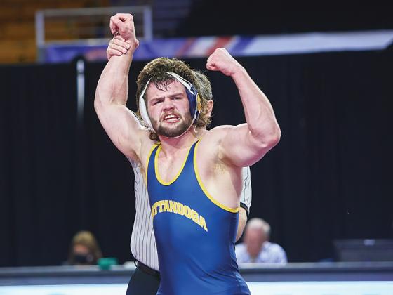 University of Tennessee — Chattanooga wrestler Matthew Waddell has his hand raised in victory after winning the Southern Conference championship at 197 pounds. (Photo Courtesy of Andy McLean/Appalachian State Athletics)