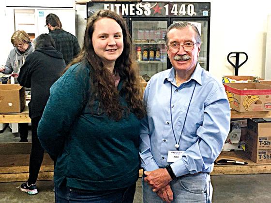 Incoming Gilmer Community Food Pantry Director Amber Kirkpatrick, left, is pictured with the food pantry’s outgoing director, Allen Triebel.