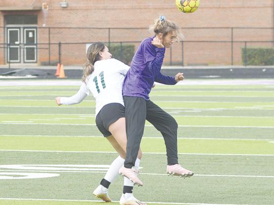 Gilmer senior Reagan Boling wins a header and scored the Lady Cats’ goal versus Lakeview-Fort Oglethorpe last Thursday.