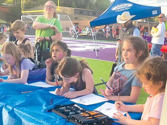 Attendees enjoyed a variety of literacy-themed activities and games during the first Family Literacy Night at Huff-Mosley Memorial Stadium in 2019. 